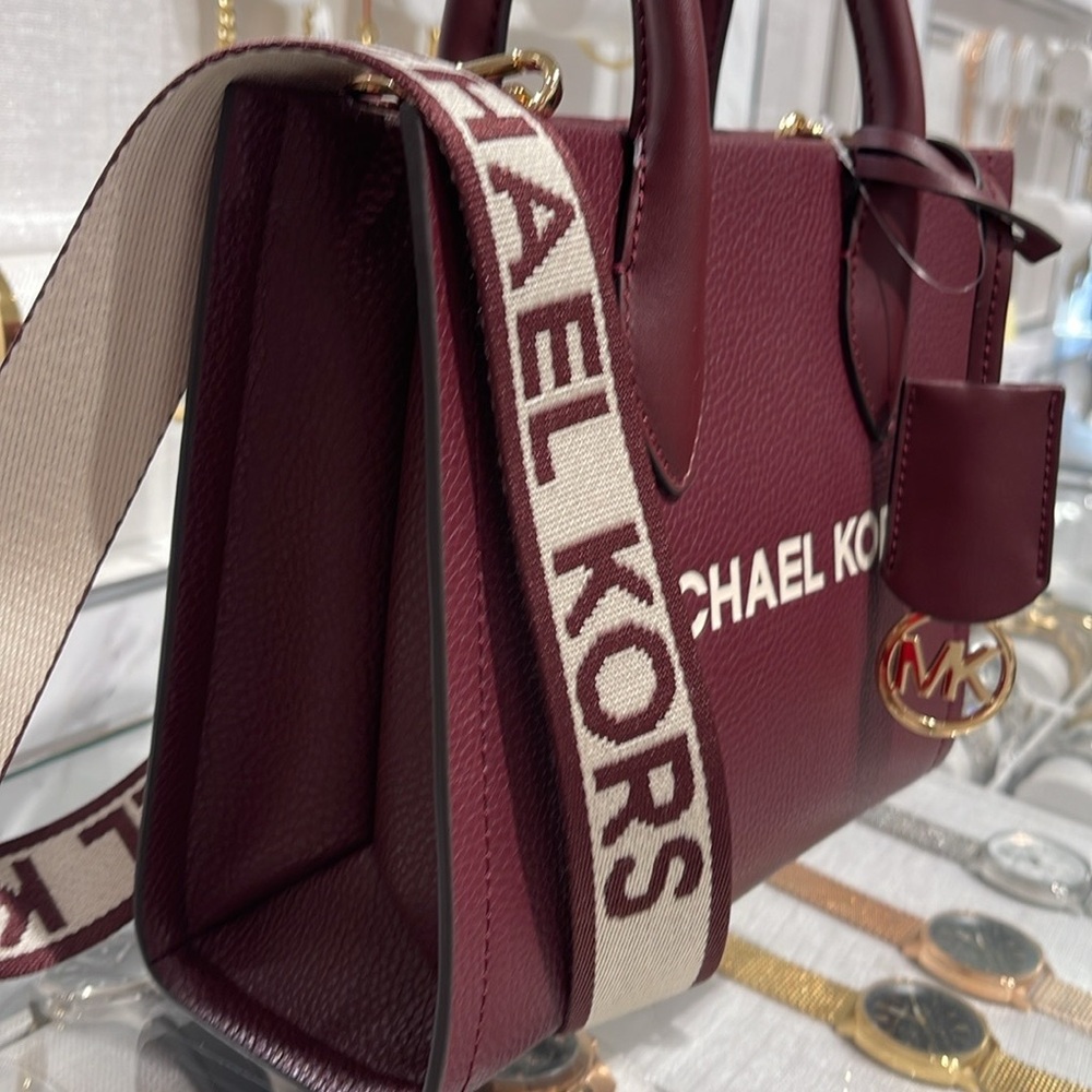 Michael Kors Mirella Small Pebbled Leather Crossbody Bag
Oxblood 
NWT - Picture 16 of 16